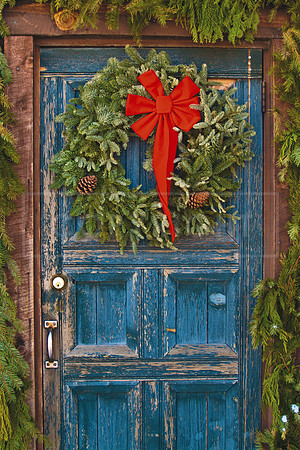 Seasonal decorations on an old rustic door in El Prado, Taos County... 5 x 7 greeting card