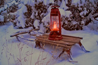An oil lamp on a sled by snowy sagebrush... 5 x 7 greeting card